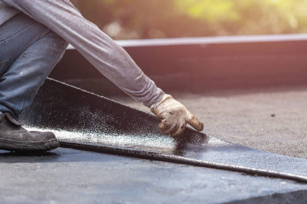 Professional Exterior Waterproofing technician working in Huntington Station, NY